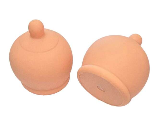 Breast shaped whistle