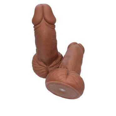 Penis-shaped whistle with testicles