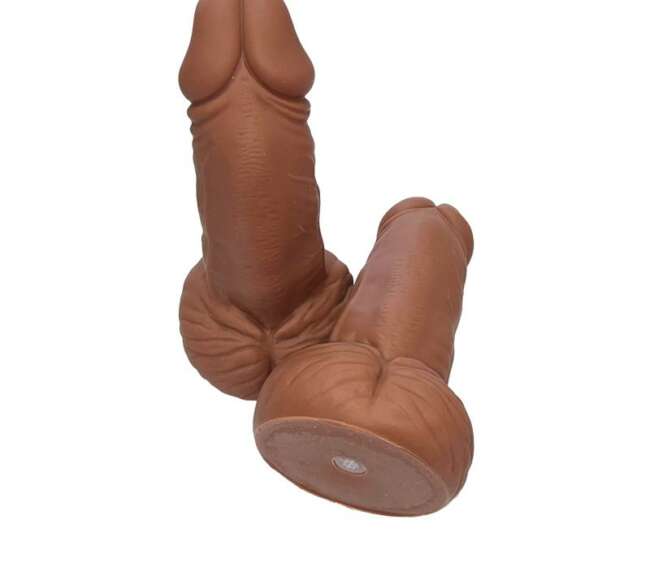 Penis-shaped whistle with testicles